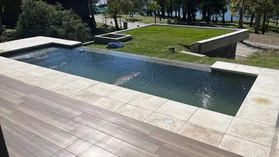 a swimming pool in the middle of a park at Casa en Molvento in Villa Los Molinos