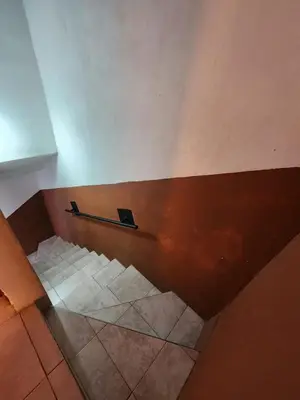 an overhead view of a staircase in a building at Altos de Grecia Cabaña 2 in Villa Carlos Paz