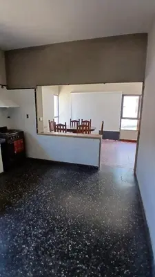 an empty room with chairs and a table in it at La casa de Rena in Santa Rosa de Calamuchita