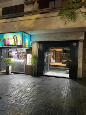 an entrance to a building with a store at Pueyrredón 76 in Cordoba