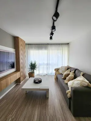 a living room with a couch and a table at Dpto Ituzaingo 1270 - 2 dormitorios in Cordoba