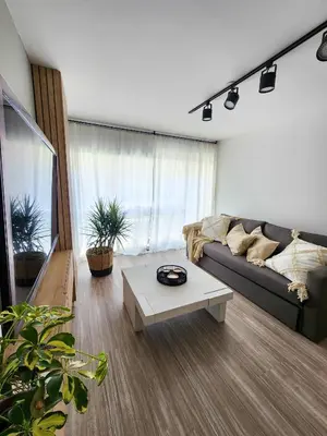 a living room with a couch and a coffee table at Dpto Ituzaingo 1270 - 2 dormitorios in Cordoba