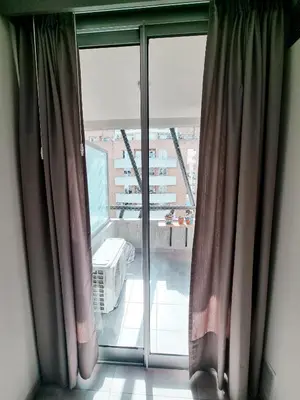 an open window with a view of a balcony at Dpto ituzaingo 741 - 1 dormitorio in Cordoba