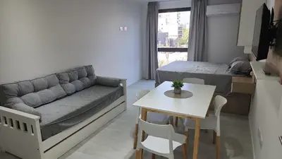 a living room with a couch and a table at Miralejos 16 Apartamento in Villa Carlos Paz