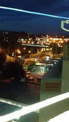 a view of a parking lot at night with lights at CARLOS PAZ, Dpto, 3 Huésped in Villa Carlos Paz