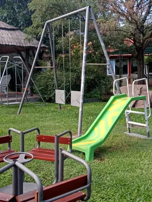 a playground with a slide in a park at Los Estribos Merlo in Merlo
