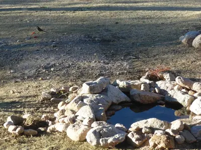 a pile of rocks on the side of a road at Cabañas 