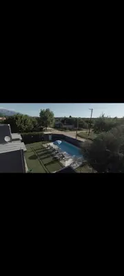 a view of a swimming pool in a yard at Manzanillas in Mina Clavero