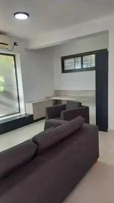 a living room with a couch and a window at Alojamiento en Villa La Bolsa in La Bolsa