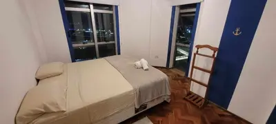 a bedroom with a bed with a towel on it at Departamento Lugones Nva Córdoba in Cordoba