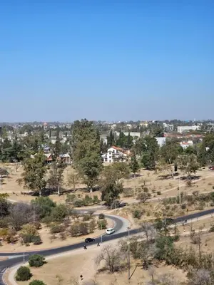 a winding road in a city with cars on it at Dpto Ambrosio Olmos 1090 - Pileta, Asadores, Terraza, Quincho in Cordoba