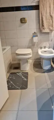 a bathroom with a toilet and a sink at Monoambiente Centrico in Cordoba