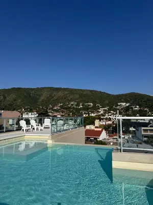 a large swimming pool on top of a building at Espectacular Departamento Carlos Paz in Villa Carlos Paz