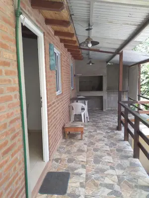 an outdoor patio with a table and a ceiling at MabiSil in Mina Clavero