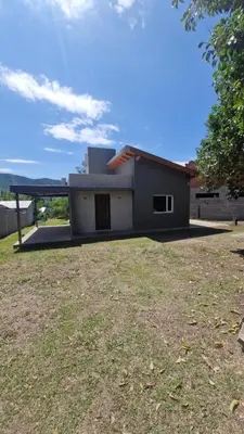 a house with a large yard in front of it at 