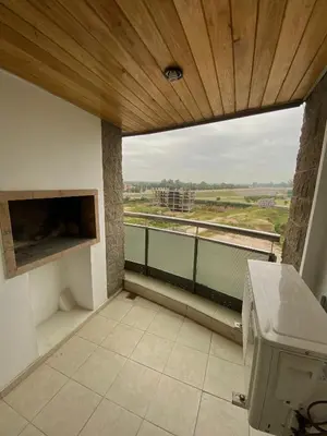 a bathroom with a large window with a view at Departamento barrio cerrado en altura in Cordoba