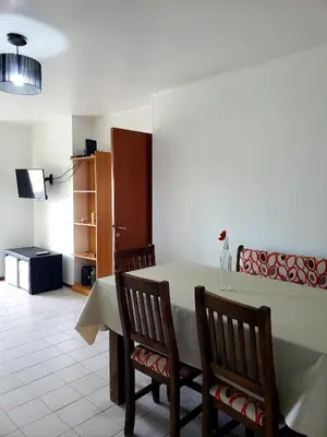 a dining room with a table and chairs at Departamento en Barrio Centro Av Colon in Cordoba