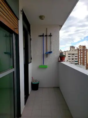 a room with a cross on the side of a building at Departamento en Barrio Centro Av Colon in Cordoba
