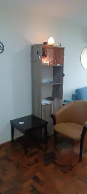 a living room with a couch and a coffee table at Dpto Nueva Cordoba frente Palacio Ferreyra a 100mt Consulado España in Cordoba