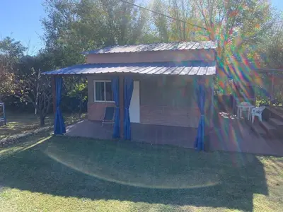a small house with a gazebo in a yard at Don Valerio in Mina Clavero
