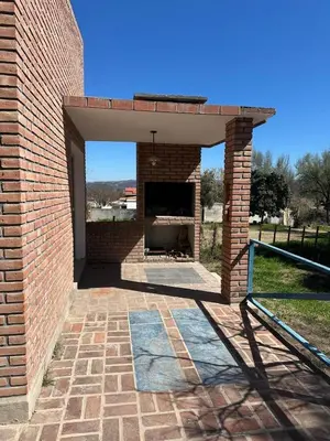 a brick pizza oven in a brick building at Don Valerio in Mina Clavero