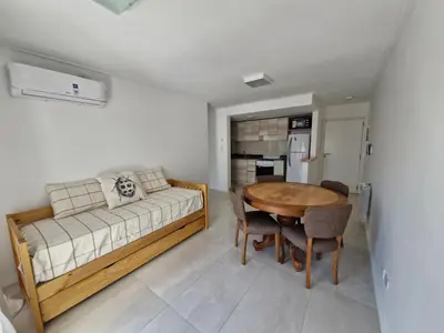 a living room with a table and a couch at Bonito departamento in Cordoba