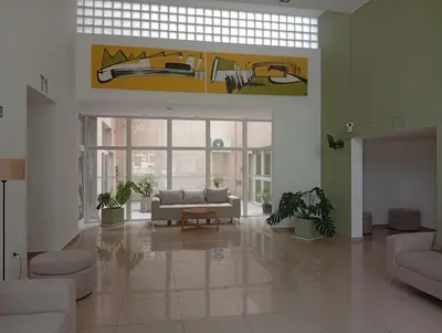 a living room with a couch and a table at Depto Balcones Cofico 4 in Cordoba