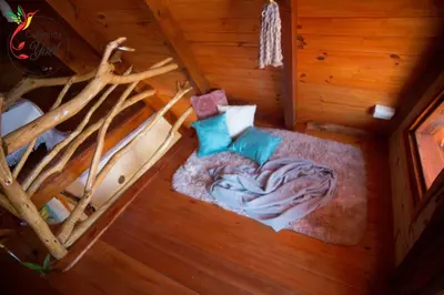 an overhead view of a bed in a cabin at Cabaña Yael in Villa Parque Siquiman