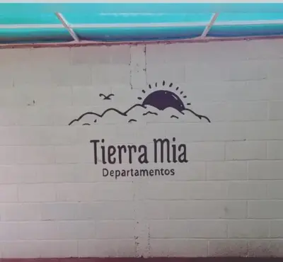 a sign for the terra mita departments on a wall at Tierra Mia II in Carpintería
