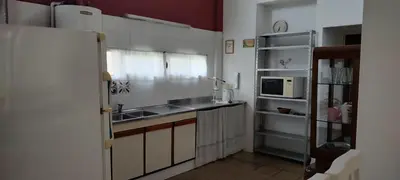 a kitchen with a sink and a microwave at DEPARTAMENTO CORDOBA Capital ZONA NORTE in Cordoba