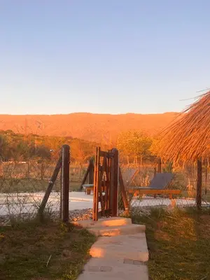 a wooden gate in the middle of a road at Ranchos de la Tata in Las Calles