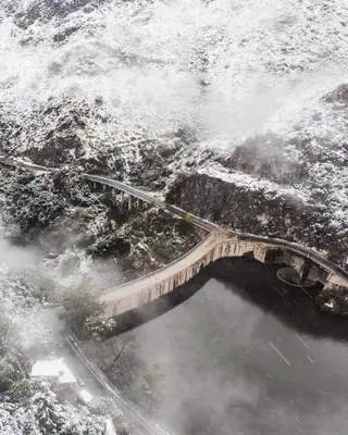 an aerial view of a bridge over a body of water at Karylago in Casa Bamba