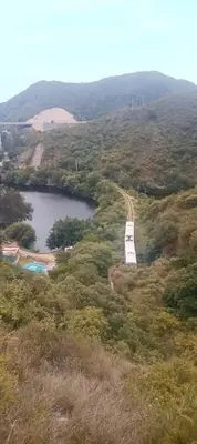 an airplane is flying over a body of water at Karylago in Casa Bamba
