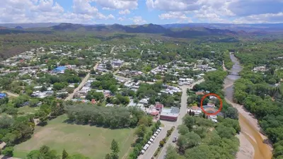 an aerial view of a town with a red circle at Casa en el Río in Alpa Corral