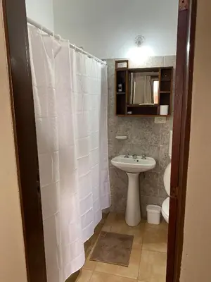 a bathroom with a sink and a toilet at La moora in Alta Gracia