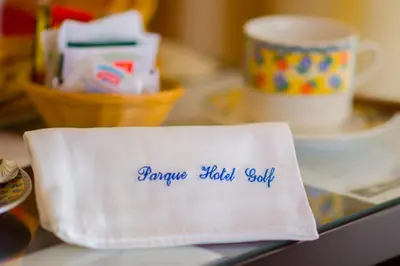 a white napkin with the words remove killed salt on it at Hotel Parque in Merlo