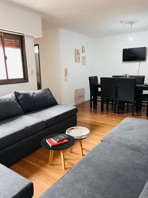 a living room with a couch and a table at AMOBLADOS CORDOBA - Centro Histórico in Cordoba