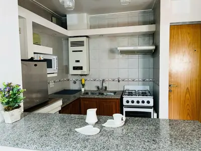 a kitchen with a stove and a counter top at AMOBLADOS CORDOBA - Centro Histórico in Cordoba