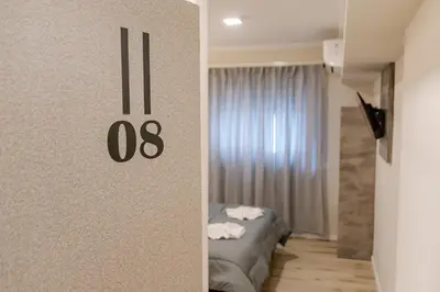 a room with two beds in a room at Brit Hotel in Villa Carlos Paz