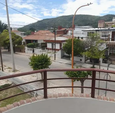 a view of a city from a balcony at Departamento céntrico Villa Carlos Paz in Villa Carlos Paz