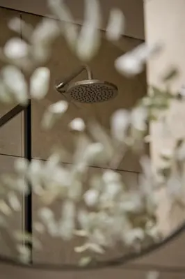 a shower with a shower head in a bathroom at Moderno loft en Güemes in Cordoba