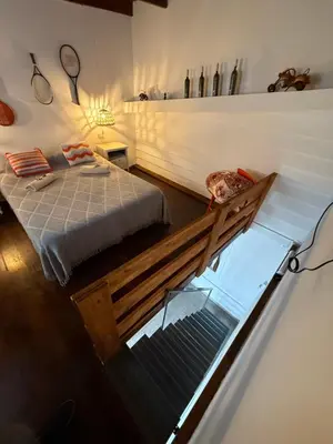 a room with a bed and a glass floor at Departamento zona norte in Cordoba