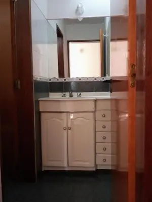a bathroom with a sink and a mirror at Petunia in Cordoba