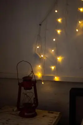 a lit up room with lights on a wall at Casita Meraki para 2 personas in Villa Carlos Paz