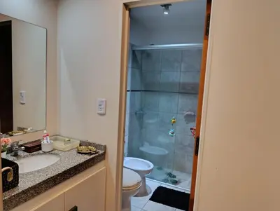 a bathroom with a shower and a sink and a toilet at Luminous department for 2 Ubicado a 10 cuadras de Shopping Nuevocentro in Cordoba