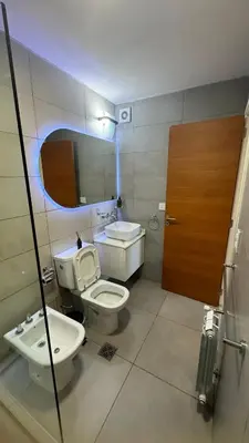 a bathroom with a toilet and a sink at Guesthouse Luxury in Cordoba