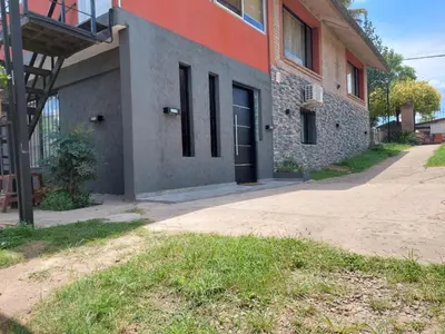 a building with a door on the side of it at EnlodelLuly in Villa Carlos Paz