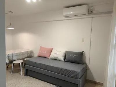 a living room with a couch and a table at Refugio en el centro in Cordoba