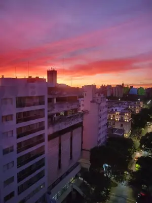 a view of a city at sunset with a building at departamento centro zona tribunales cordoba in Cordoba