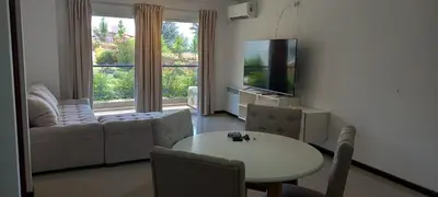 a living room with a table and a couch at Veneto Village in Villa Parque Siquiman
